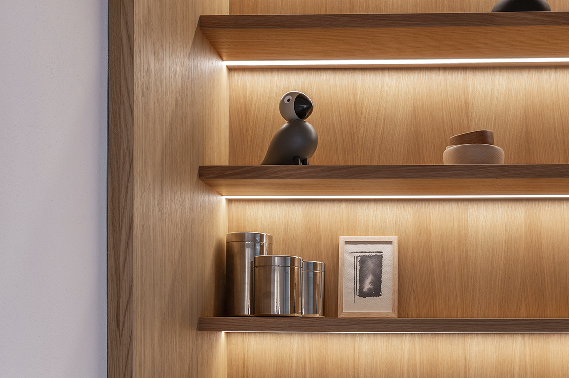 Residential kitchen interior with custom wooden cabinetry, natural light and calm material palette, photographed for interior studios and carpentry